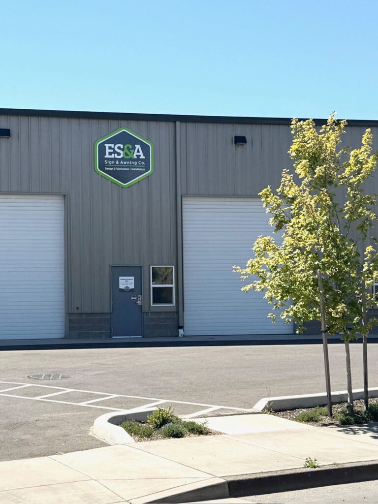 Commercial building with garage doors serviced by Crawford Windor in Eugene, Oregon