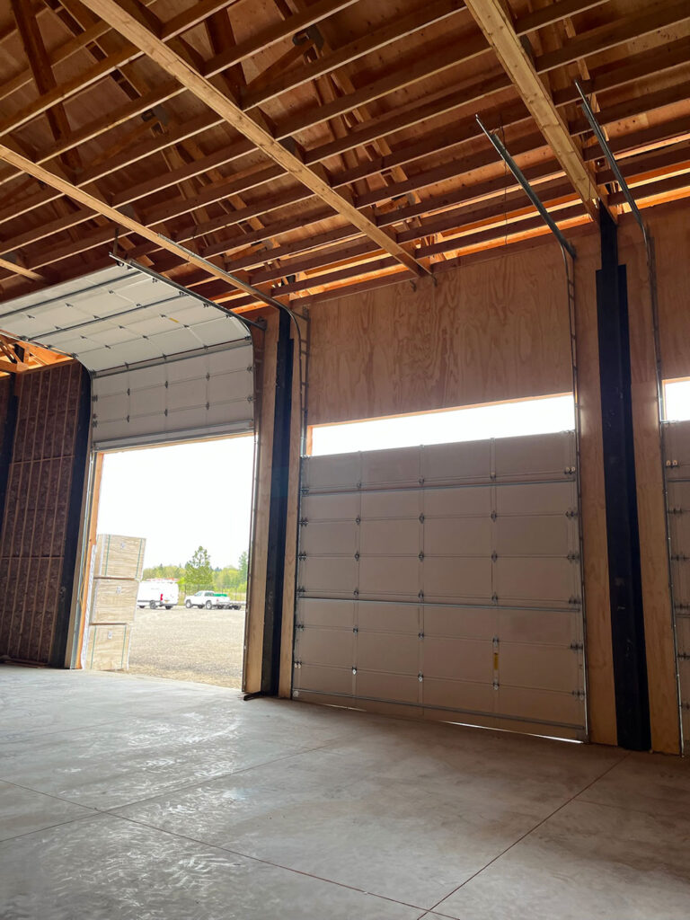 Interior of a steel building with a Crawford Windor commercial bay door