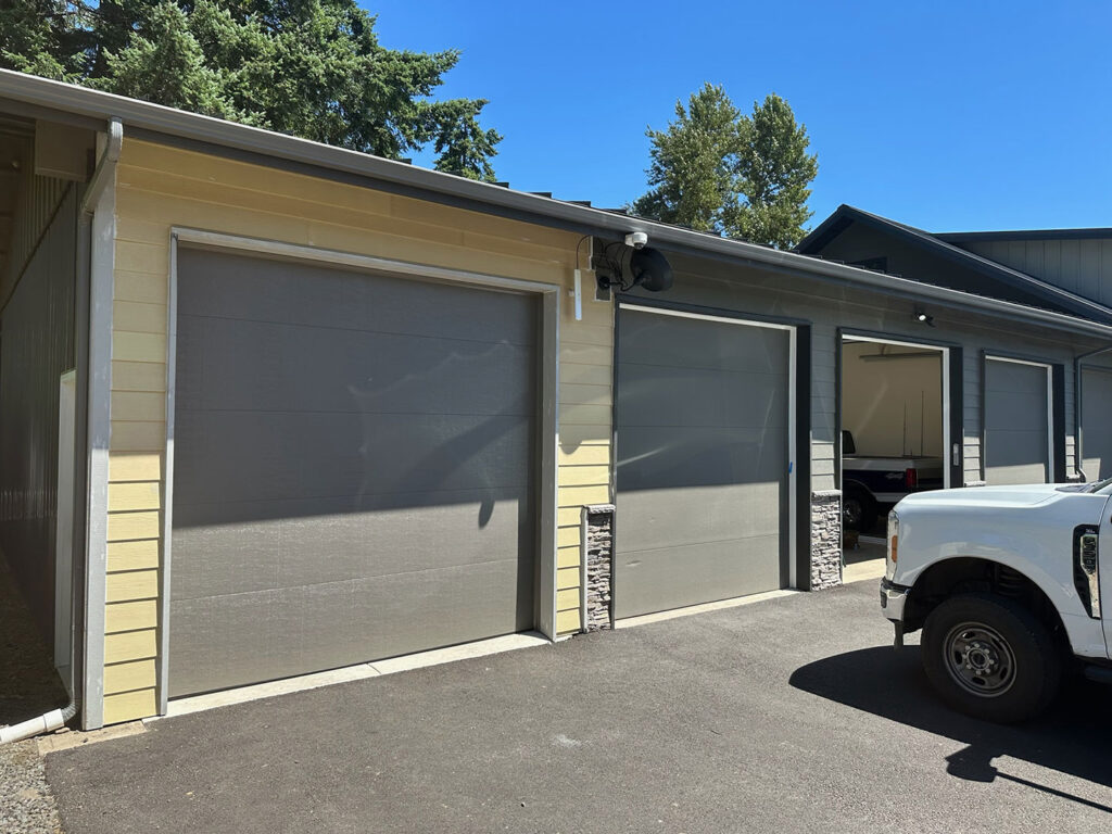 Modern flush gray garage door on a contemporary Eugene home