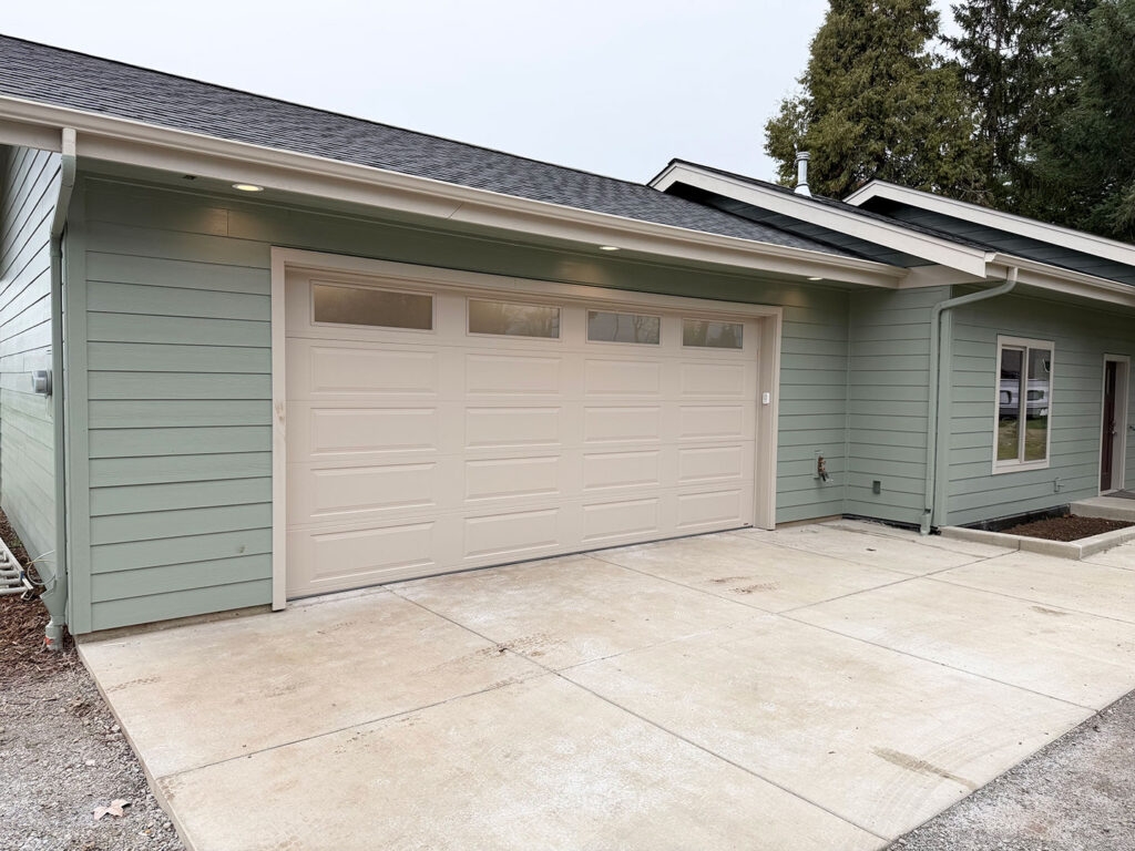 Residential garage door in Eugene, Oregon kept in good order by regular garage door maintenance