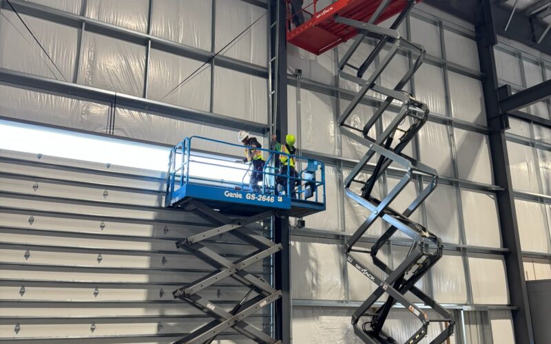 Crawford Windor crew during a commercial garage door installation in a steel building near Eugene, Oregon