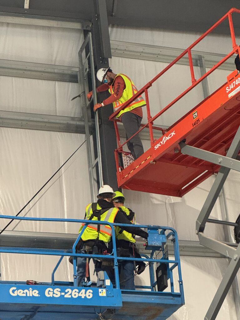 Crawford Windor crew during a commercial garage door installation in Eugene, Oregon