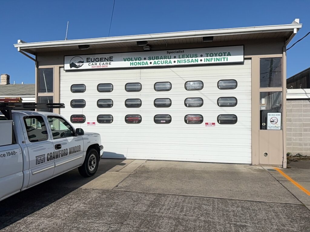 Crawford Windor service vehicle on a job site near Eugene, Oregon, where most garage door quote visits begin