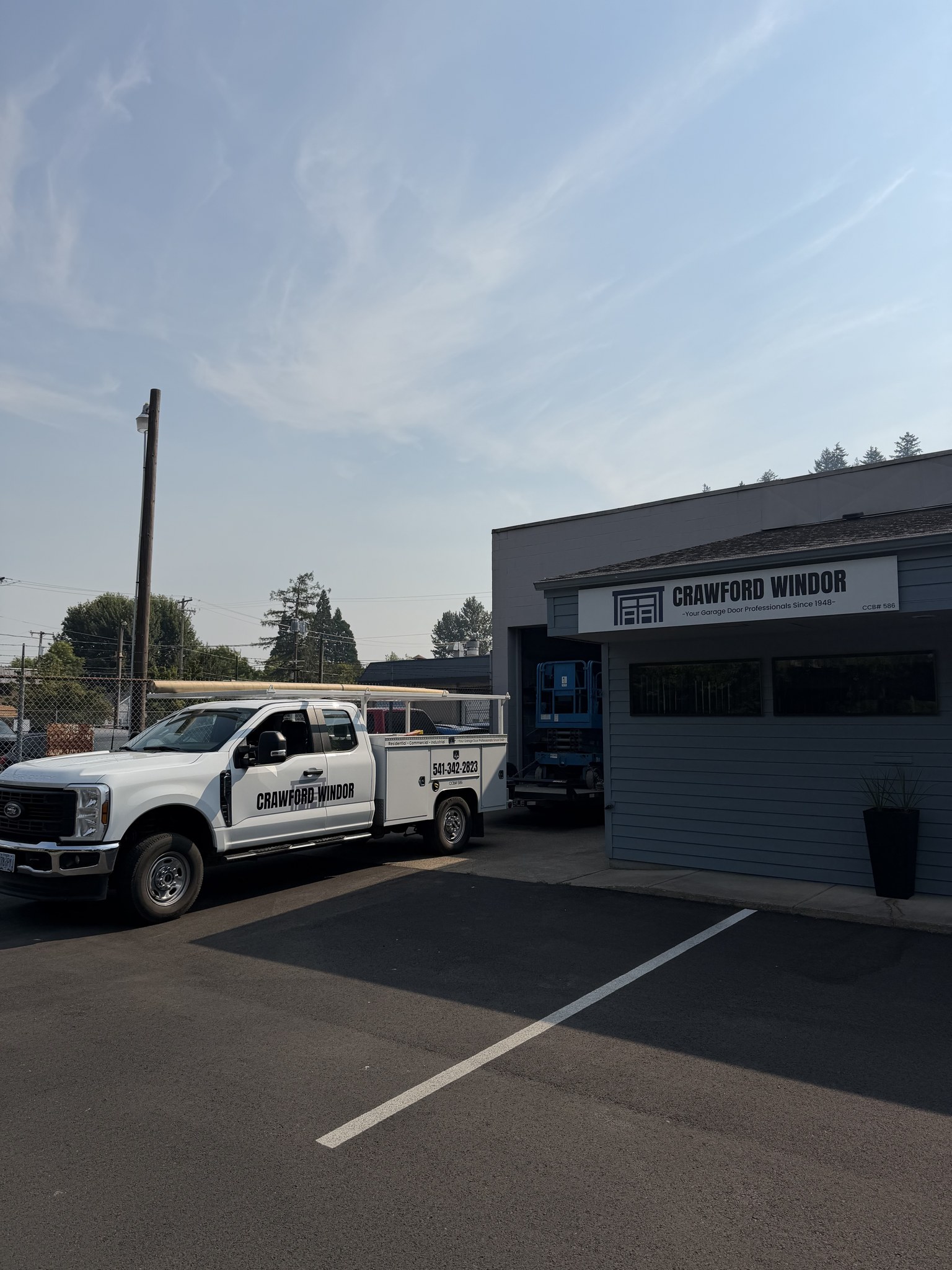 The Crawford Windor garage door repair shop and service truck on Washington Street in Eugene, Oregon